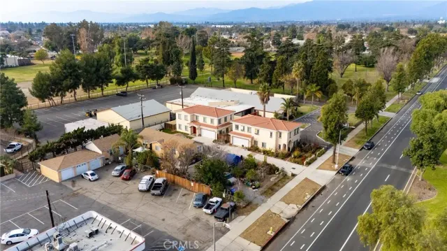 an aerial view of a house with a garden