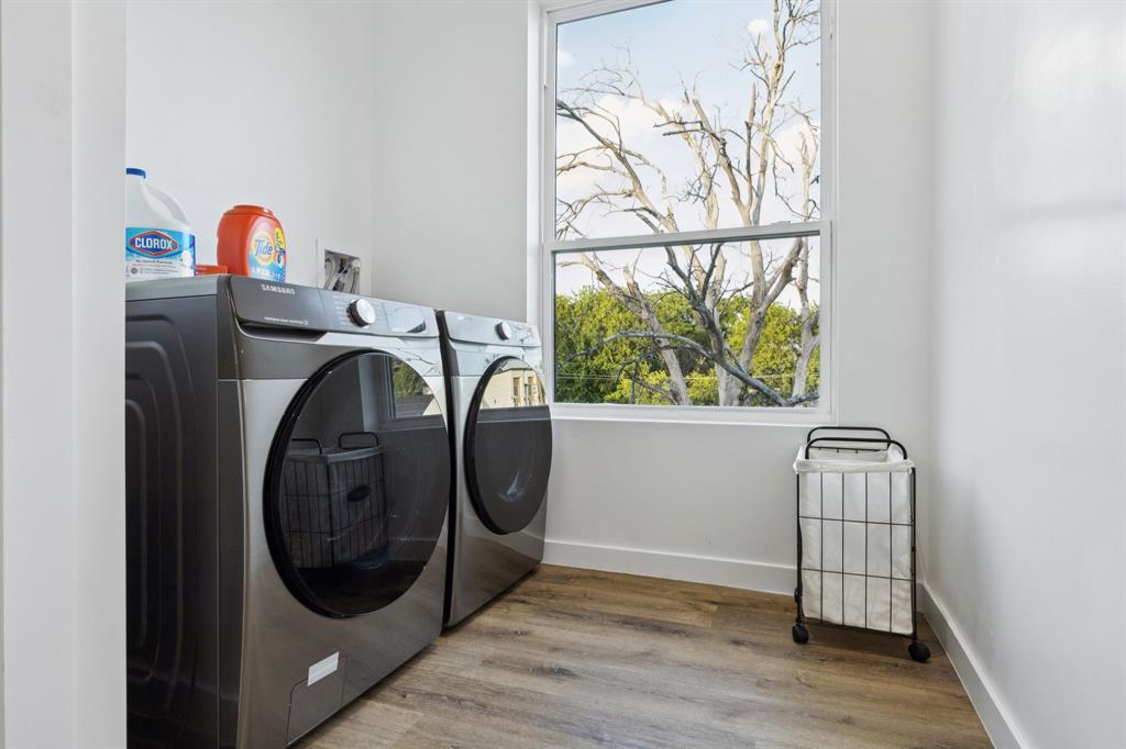 907 Bayonne Street Dallas, TX 75212 - Photo 16 of 38 wooden floor with a washer and dryer