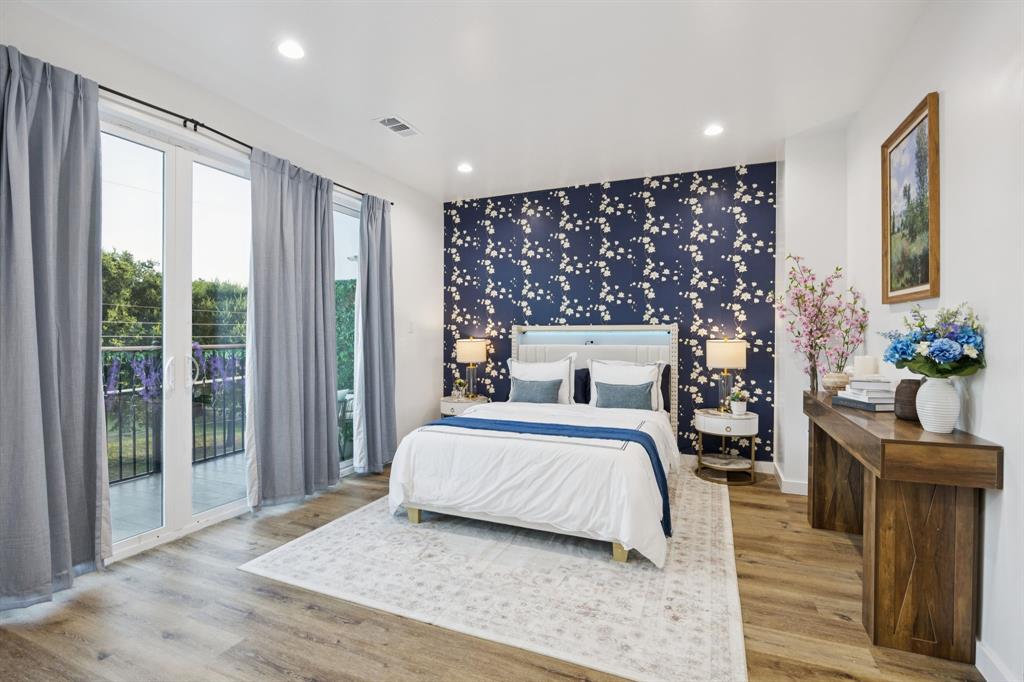 907 Bayonne Street Dallas, TX 75212 - Photo 20 of 38 a spacious bedroom with a bed and a window