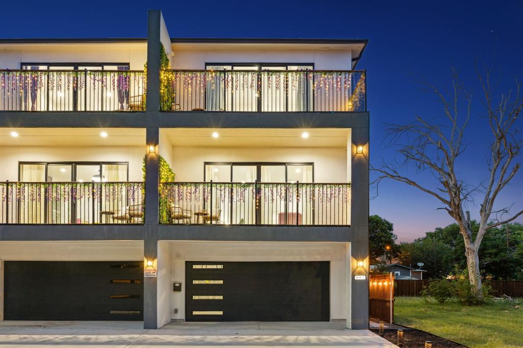 907 Bayonne Street Dallas, TX 75212 - Photo 2 of 38 a front view of a building with a garden