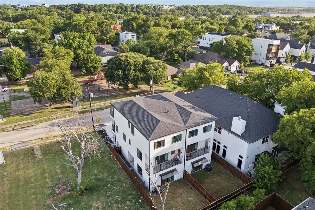 907 Bayonne Street Dallas, TX 75212 - Photo 27 of 38 an aerial view of multiple houses with a yard