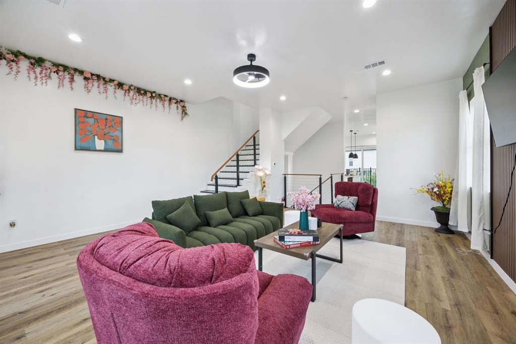 907 Bayonne Street Dallas, TX 75212 - Photo 7 of 38 a living room with furniture and a wooden floor