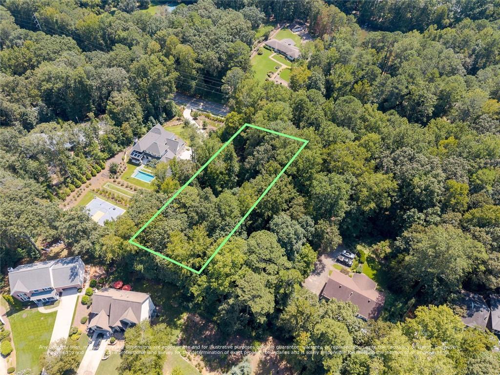 657 Willeo Road Roswell, GA 30075 - Photo 11 of 18 a view of a house with a yard