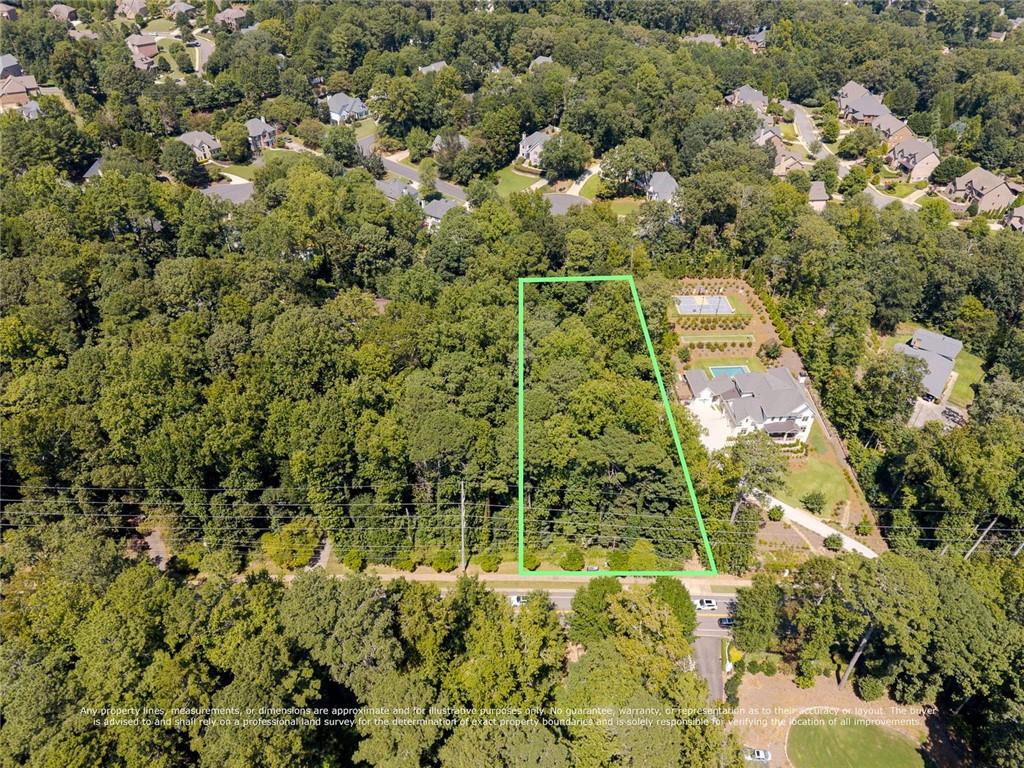 657 Willeo Road Roswell, GA 30075 - Photo 15 of 18 an aerial view of residential houses with yard