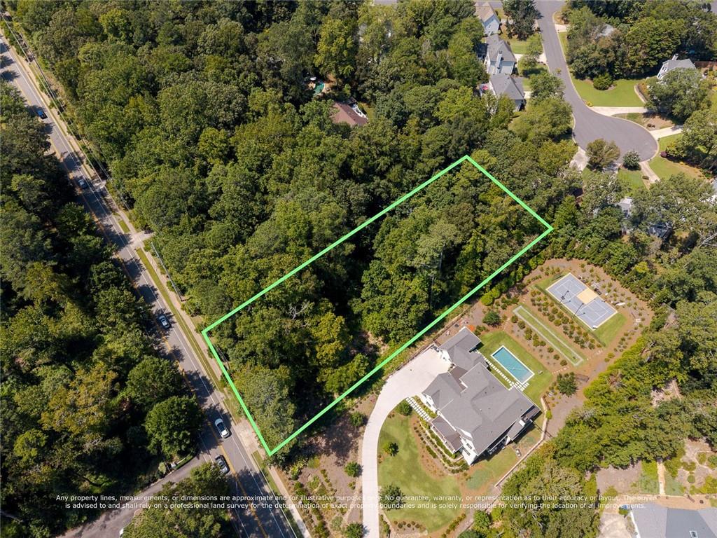 657 Willeo Road Roswell, GA 30075 - Photo 8 of 18 an aerial view of a house