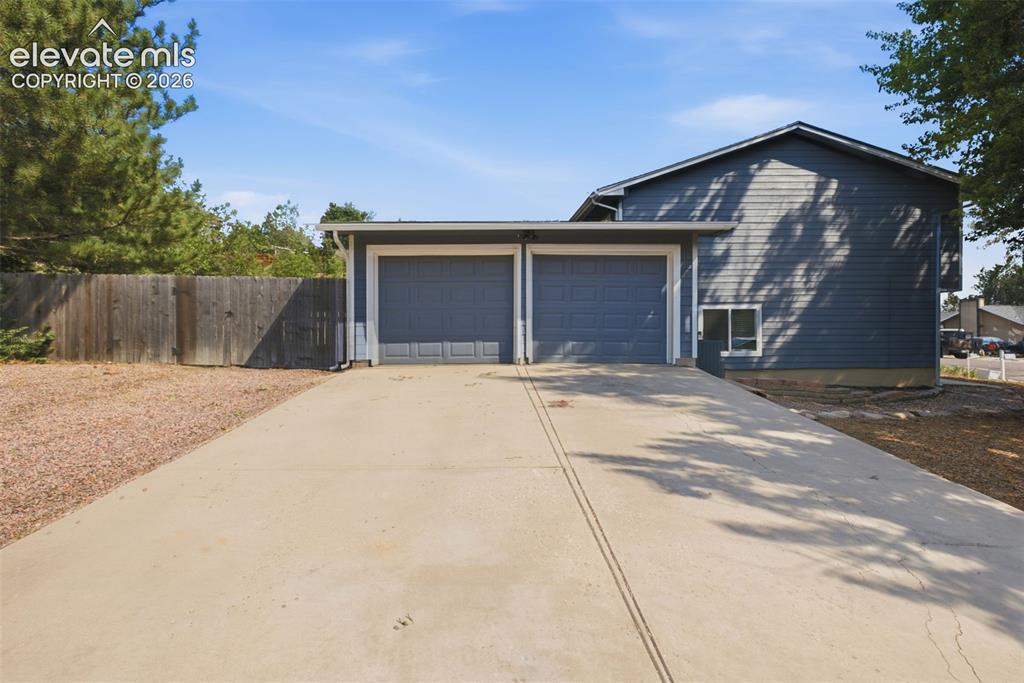 1239 Suncrest Way Colorado Springs, CO 80906 - Photo 3 of 46 2 Car Garage