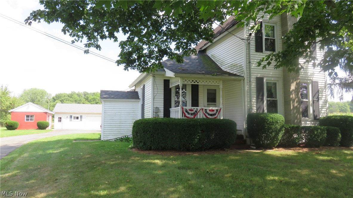 Front of home and some of the outbuildings
