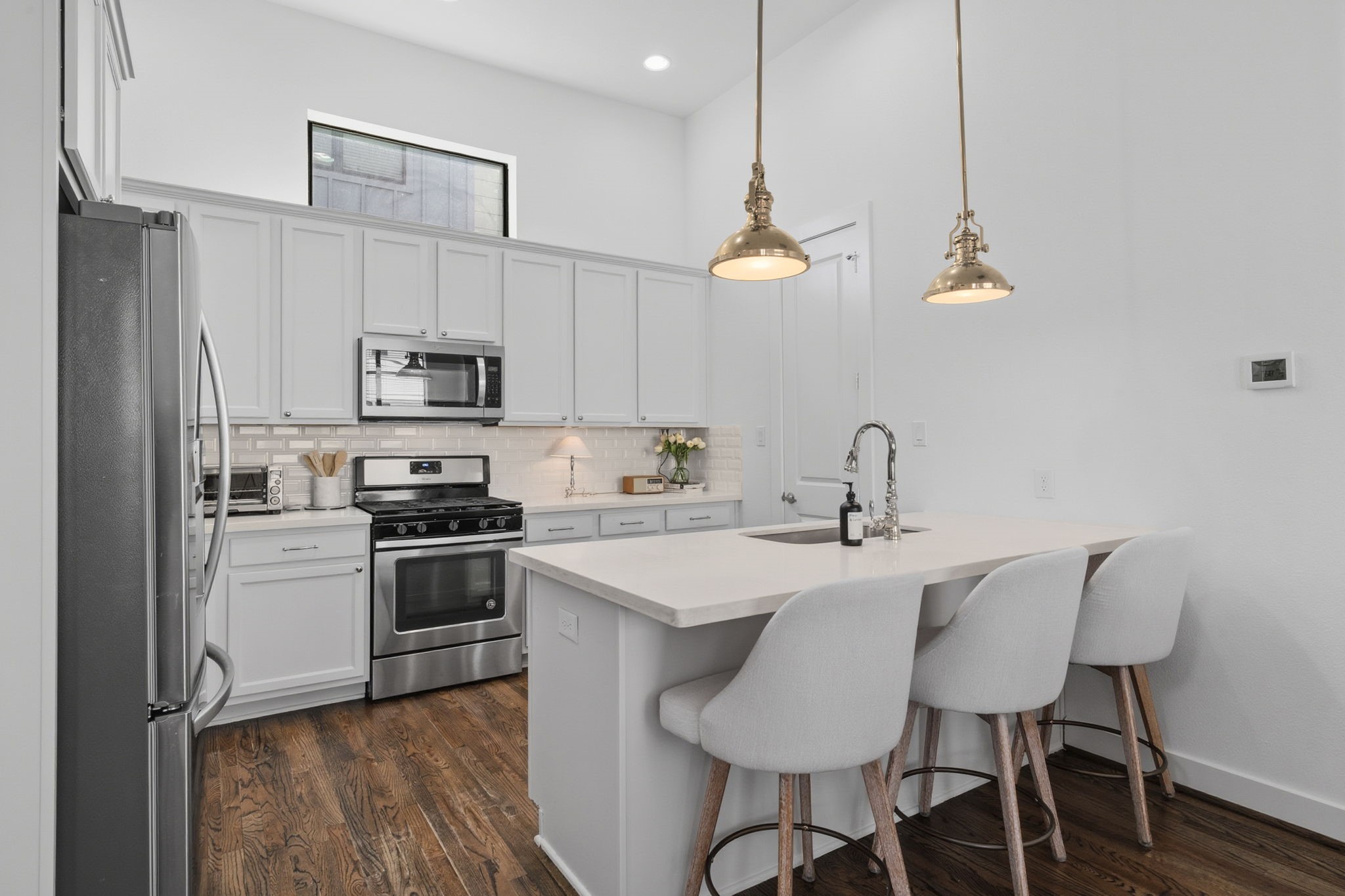 1514 Beall Street Houston, TX 77008 - Photo 14 of 33 Kitchen featuring stainless appliances and generous counter space
