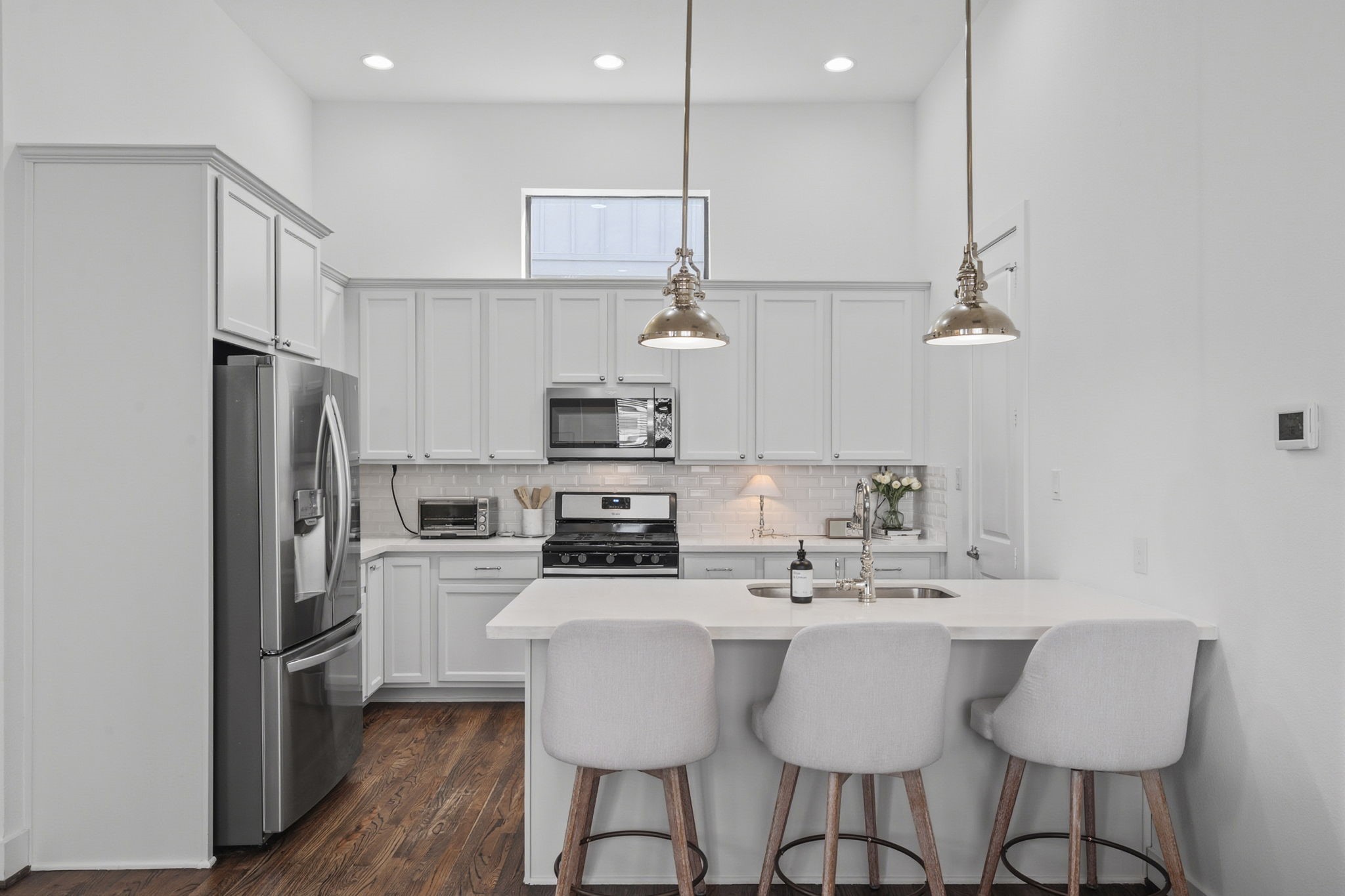 1514 Beall Street Houston, TX 77008 - Photo 15 of 33 Kitchen featuring stainless appliances and generous counter space