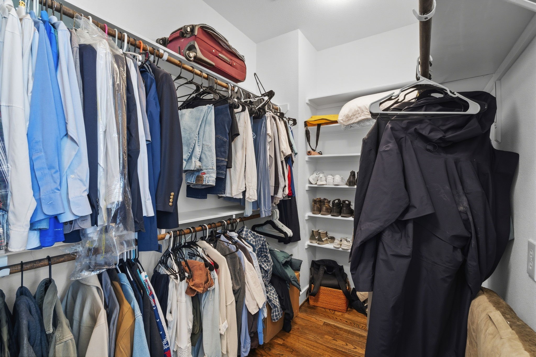 1514 Beall Street Houston, TX 77008 - Photo 23 of 33 Walk in primary closet with built in shelving and ample storage space
