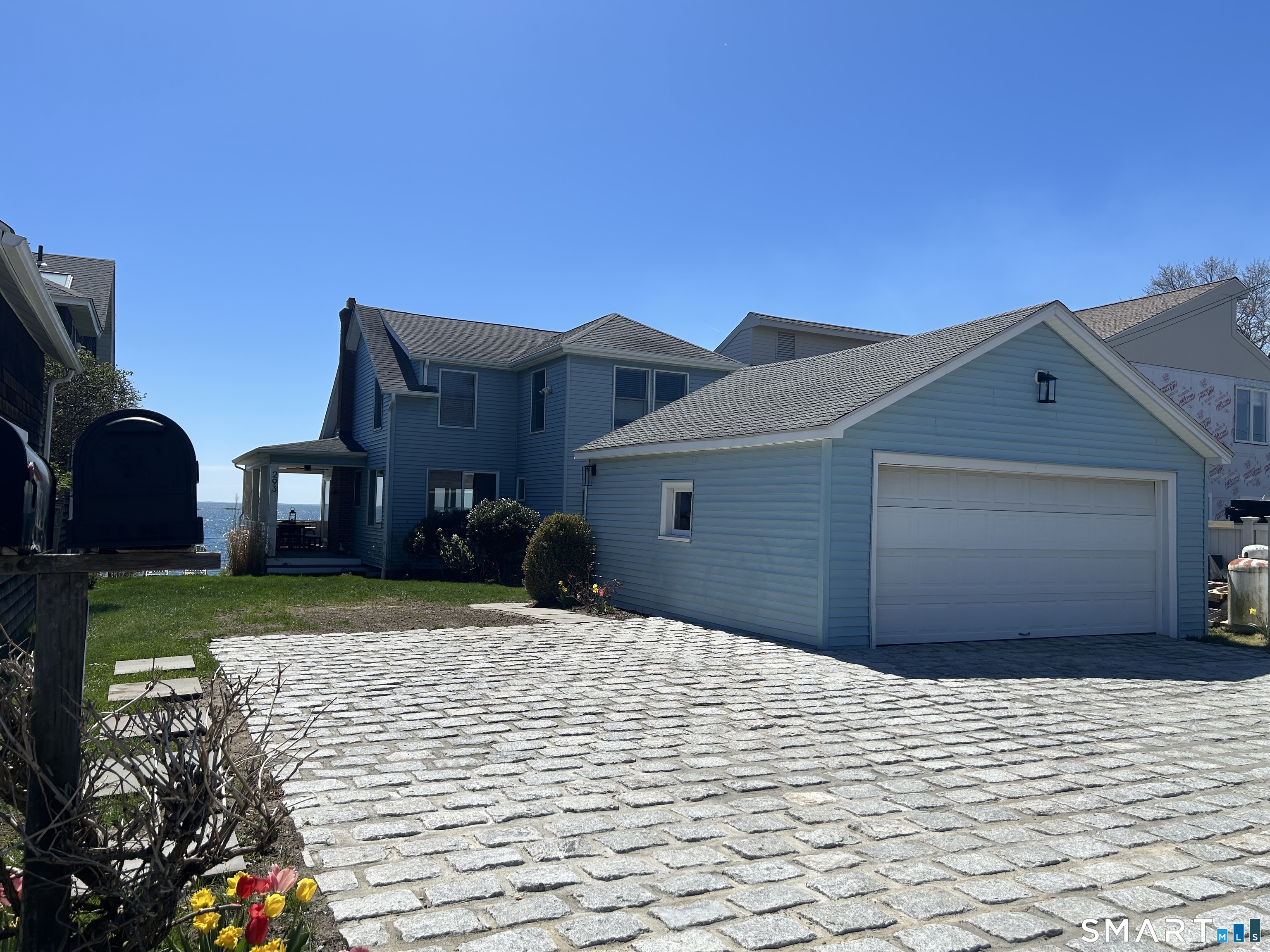 293 Giants Neck Road East Lyme, CT 06357 - Photo 1 of 21 a front view of a house with a yard