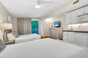 a bedroom with a bed and a cabinets