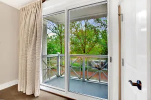 a view of a glass door with a from a window