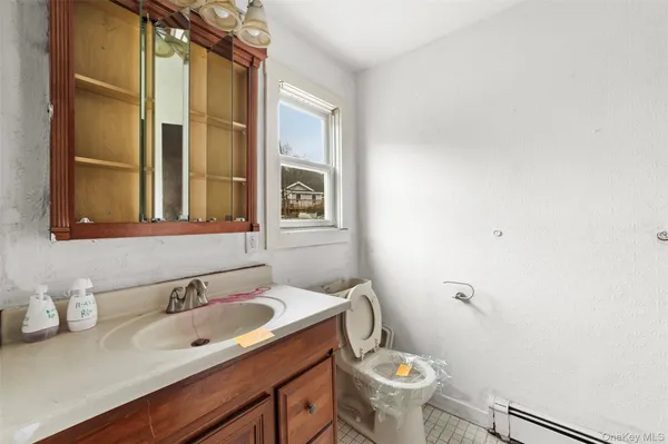 a bathroom with a sink and a toilet
