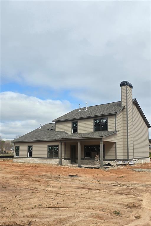 a front view of a house with a ocean view