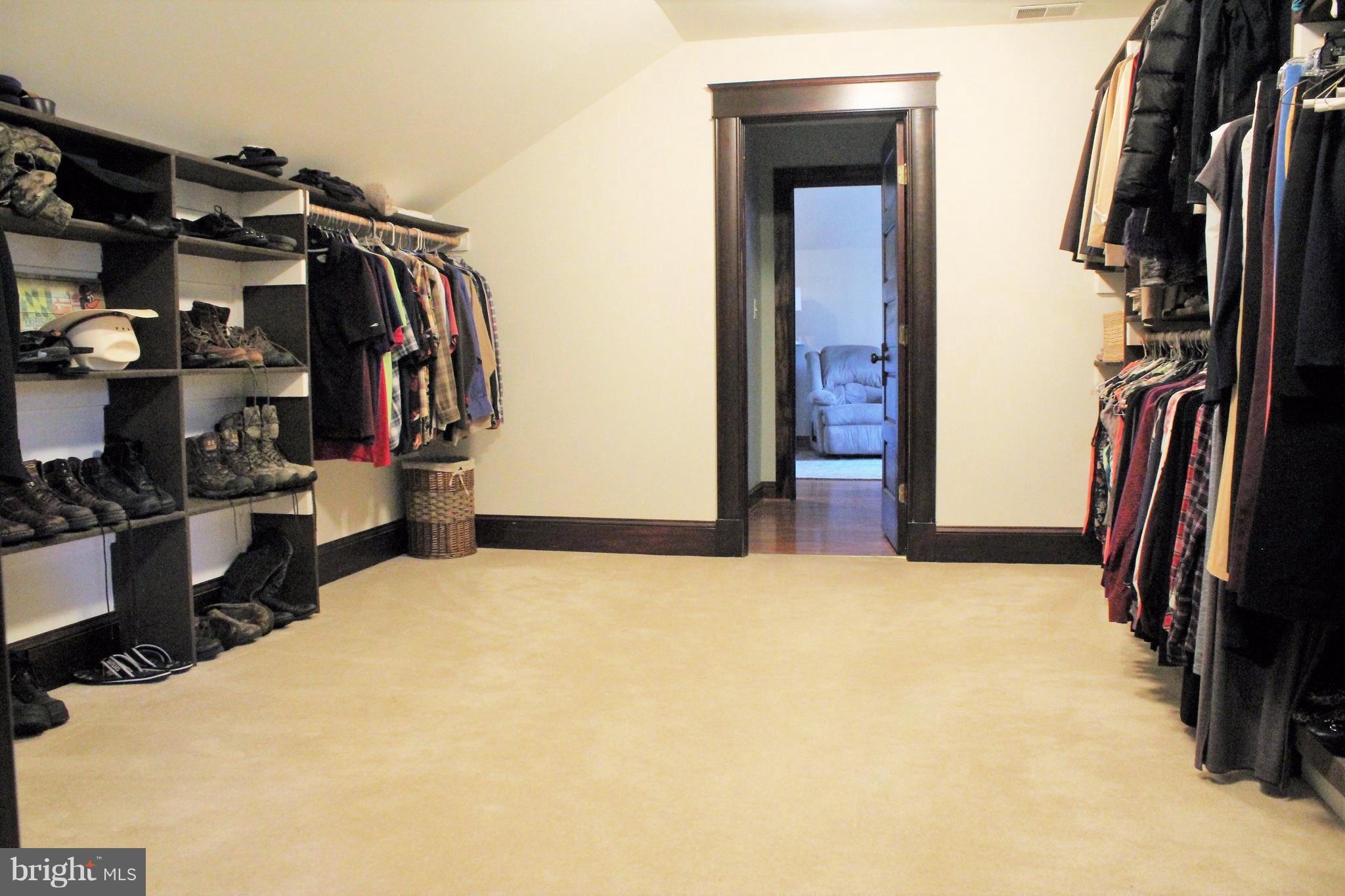 314 Hilltop Road Linthicum, MD 21090 - Photo 14 of 29 a view of walk in closet with clothes and shoes