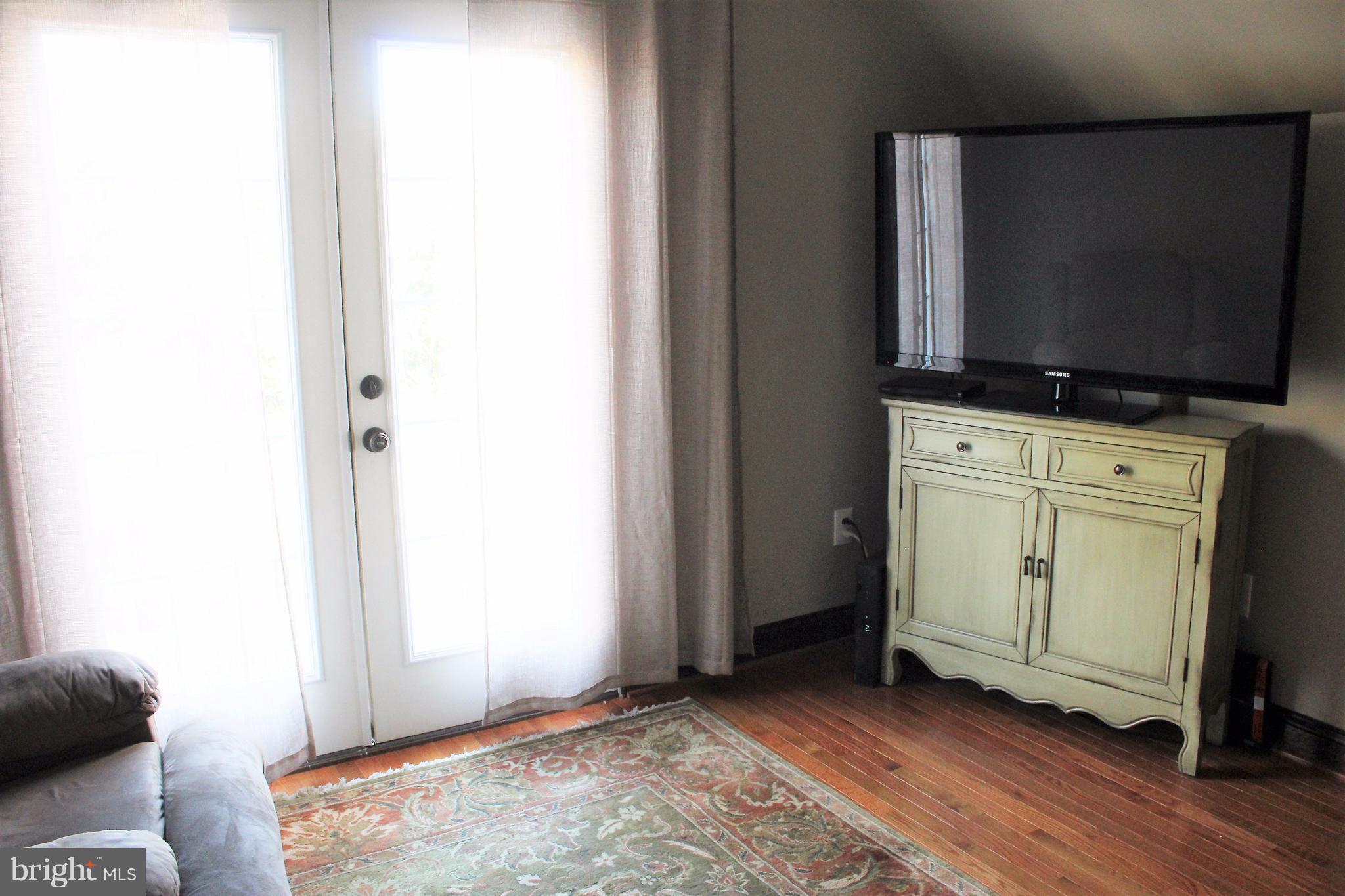 314 Hilltop Road Linthicum, MD 21090 - Photo 22 of 29 a view of cabinets and wooden floor