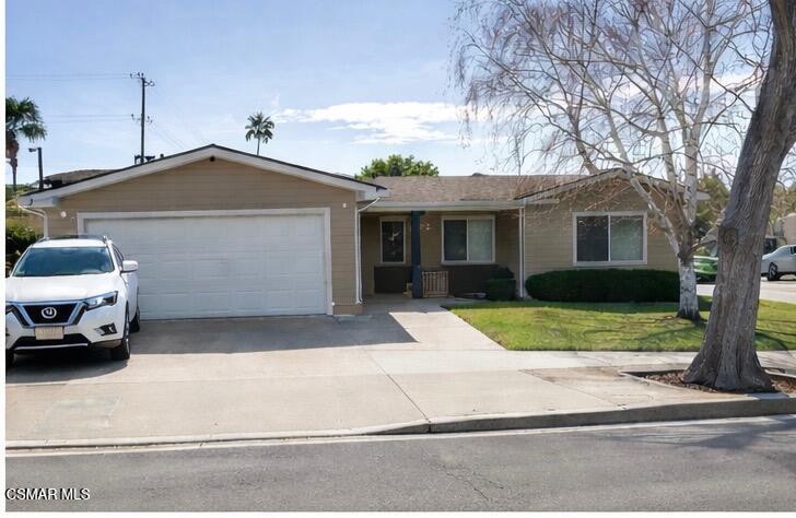 a car parked in front of a house