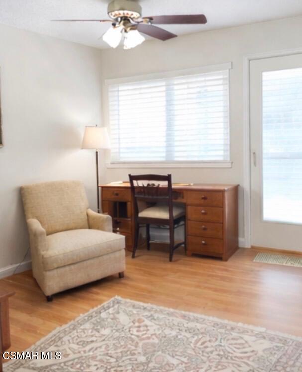 2124 Cutler Street Simi Valley, CA 93065 - Photo 5 of 5 a living room with furniture and a window