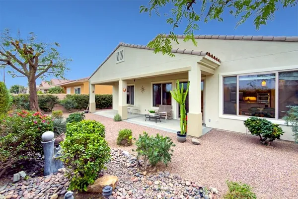 a large kitchen with stainless steel appliances