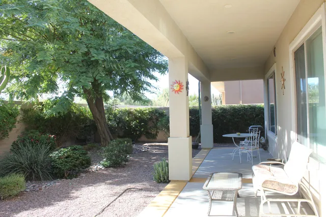 a view of yard with patio