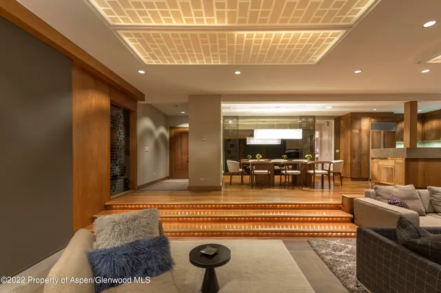 a kitchen with a table and chairs in it