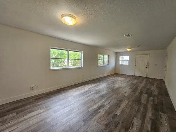 a view of an empty room and window