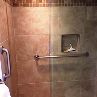 1032 South Kihei Road, Unit A203 Kihei, HI 96753 - Photo 7 of 13 a bathroom with a window and a shower