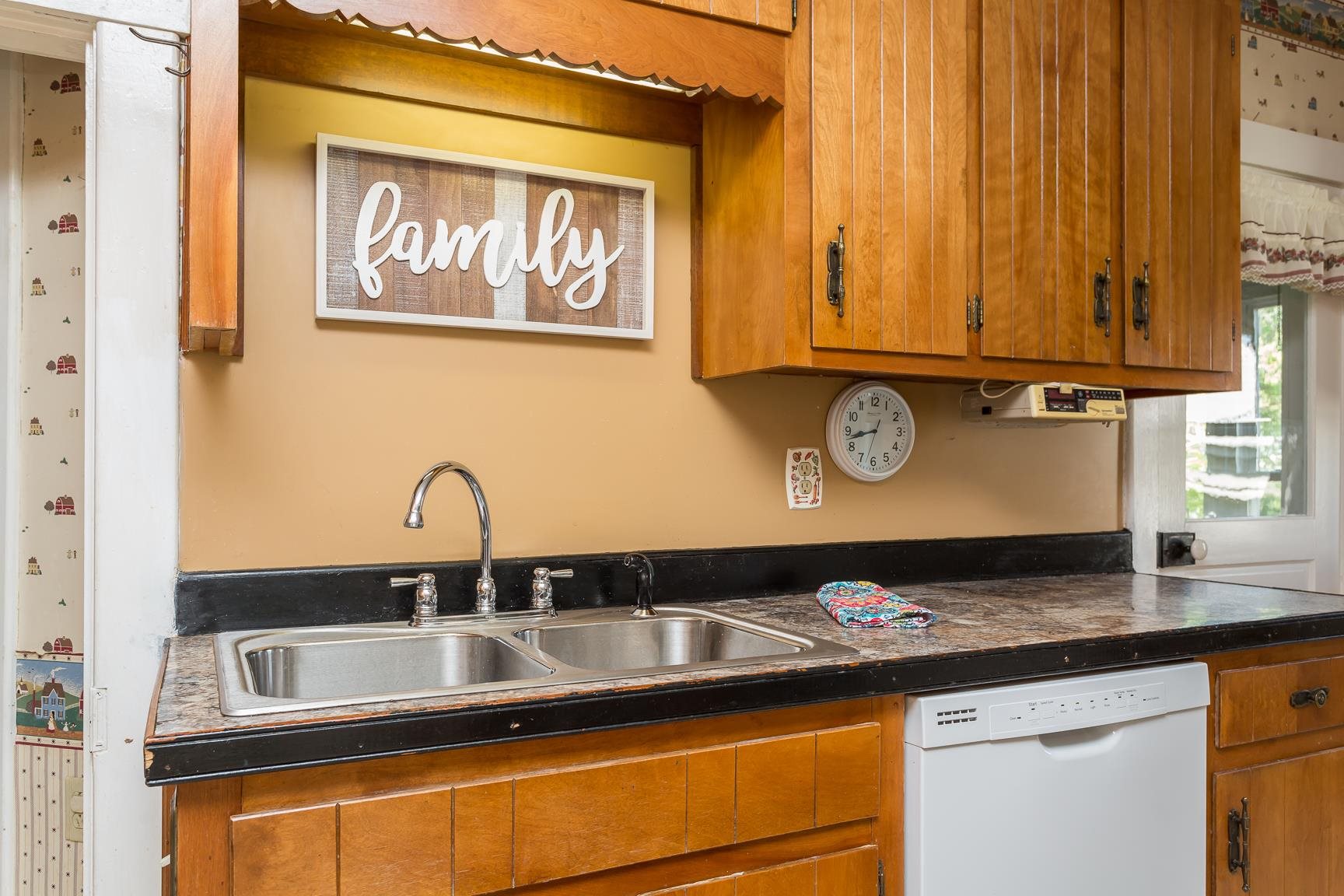 572 Battlefield Road New Hope, VA 24437 - Photo 29 of 39 a kitchen with a sink and cabinets