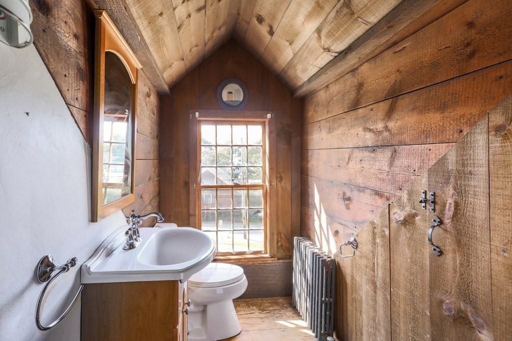 116 Spring Street Hull, MA 02045 - Photo 22 of 37 a bathroom with a sink toilet and shower