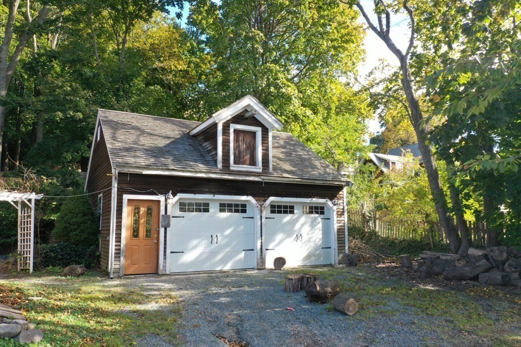 116 Spring Street Hull, MA 02045 - Photo 3 of 37 a view of a house with a yard