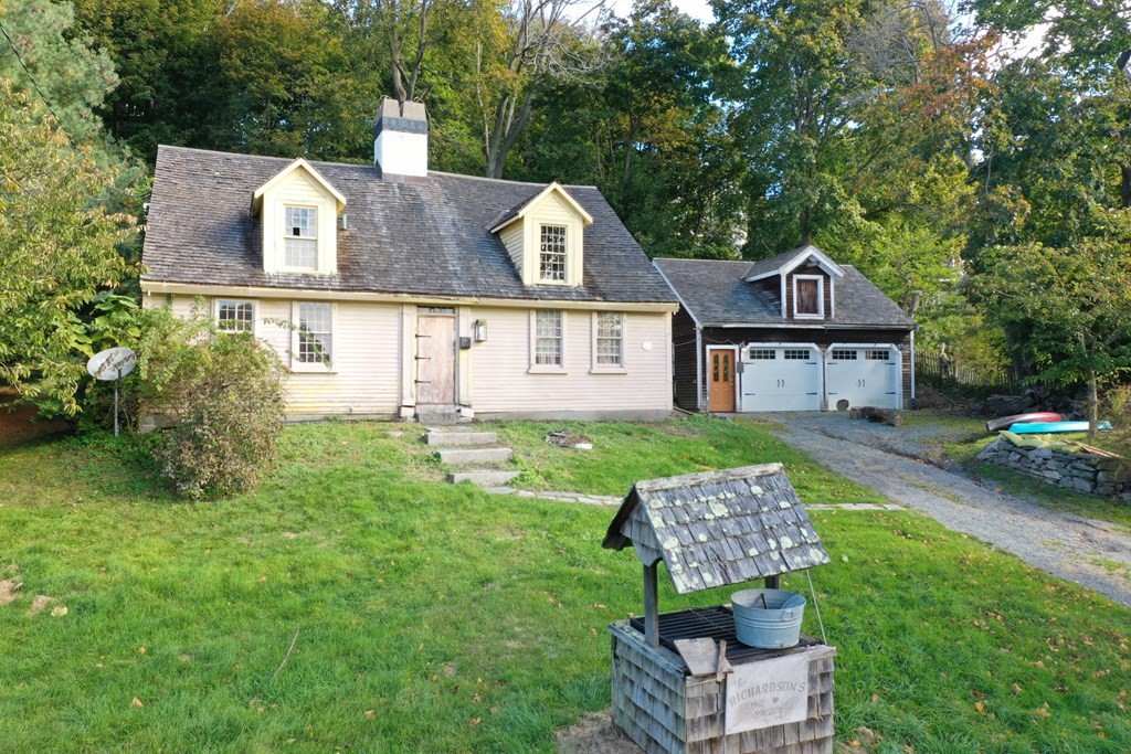 116 Spring Street Hull, MA 02045 - Photo 35 of 37 front view of a house with a yard