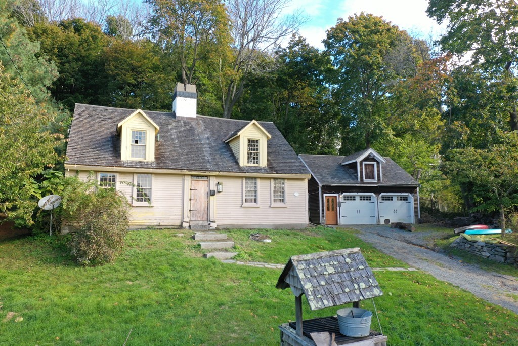 116 Spring Street Hull, MA 02045 - Photo 36 of 37 front view of a house with a yard