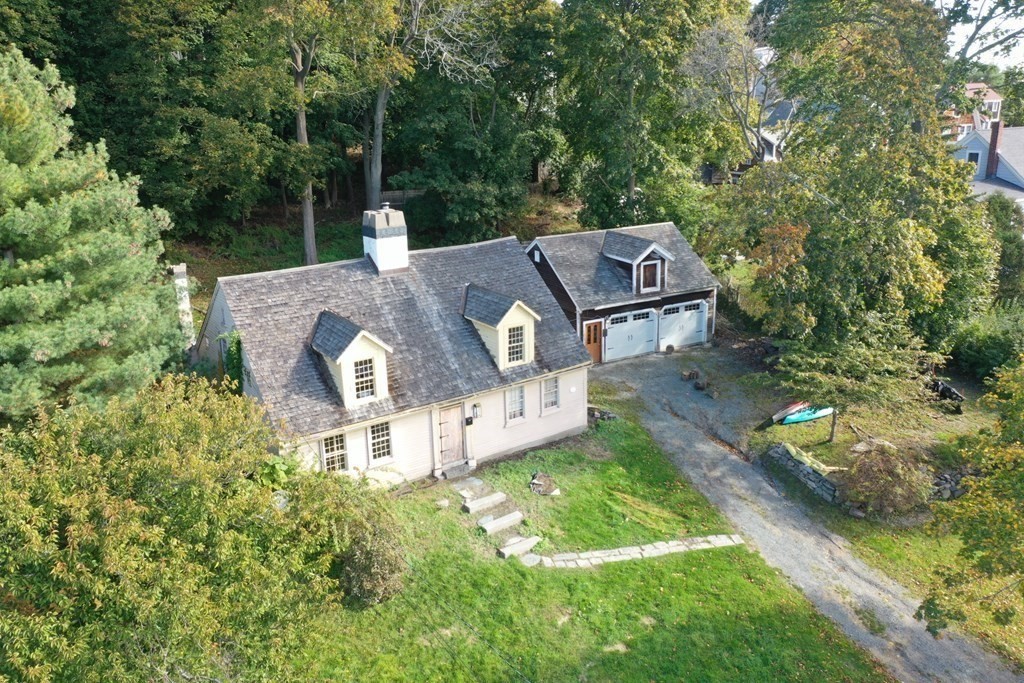 116 Spring Street Hull, MA 02045 - Photo 4 of 37 an aerial view of a house with a big yard