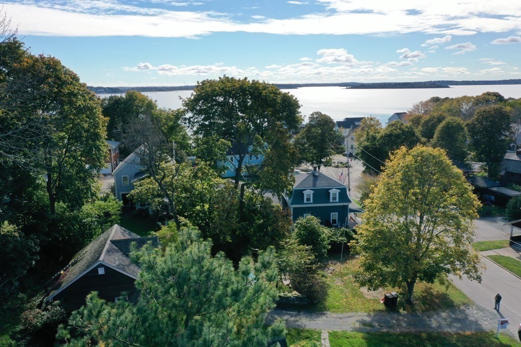 116 Spring Street Hull, MA 02045 - Photo 5 of 37 a view of a city with ocean
