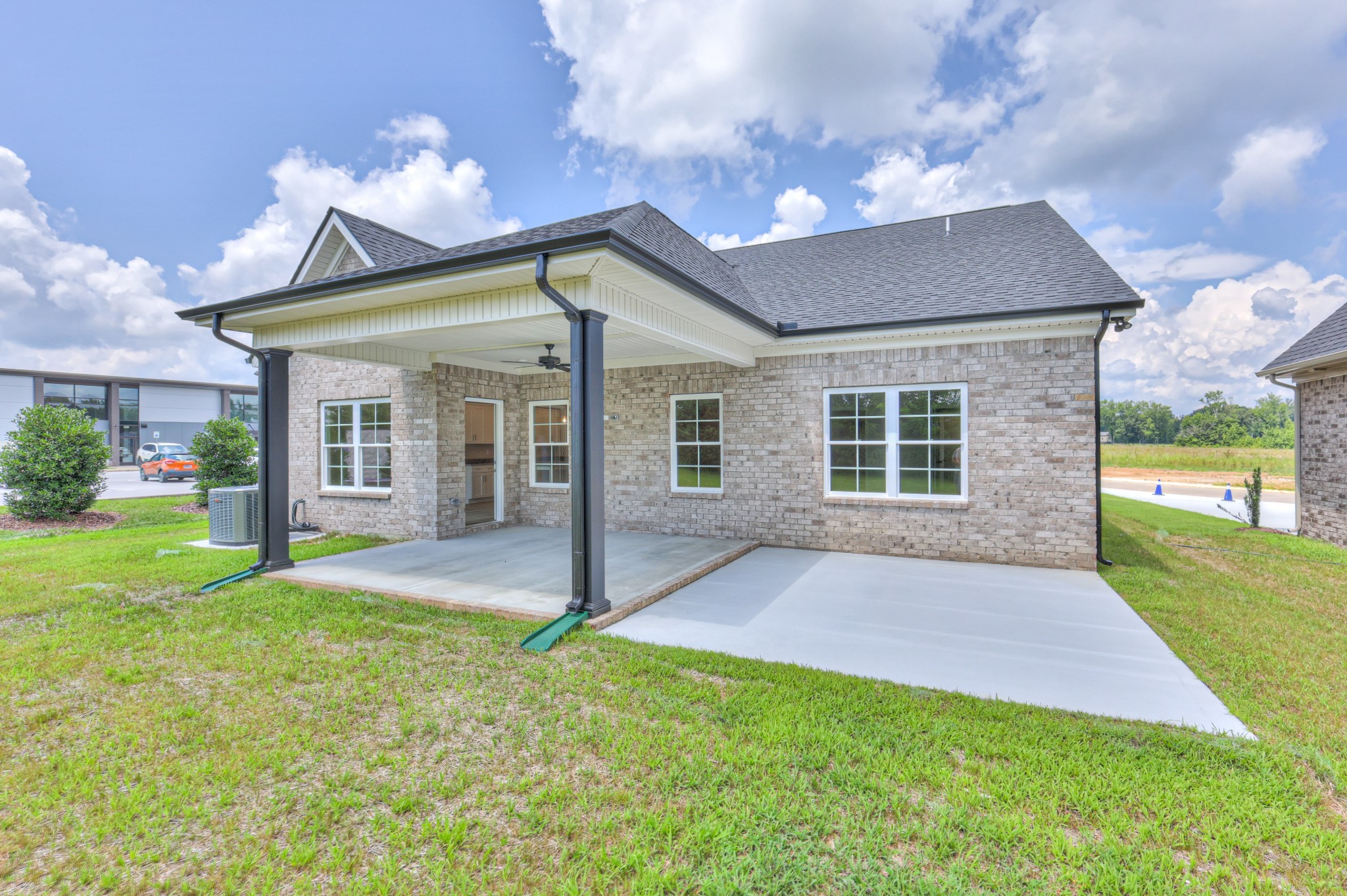 18 North Fork Branch Road Normandy, TN 37360 - Photo 26 of 28 a backyard of a house with table and chairs plants and large tree