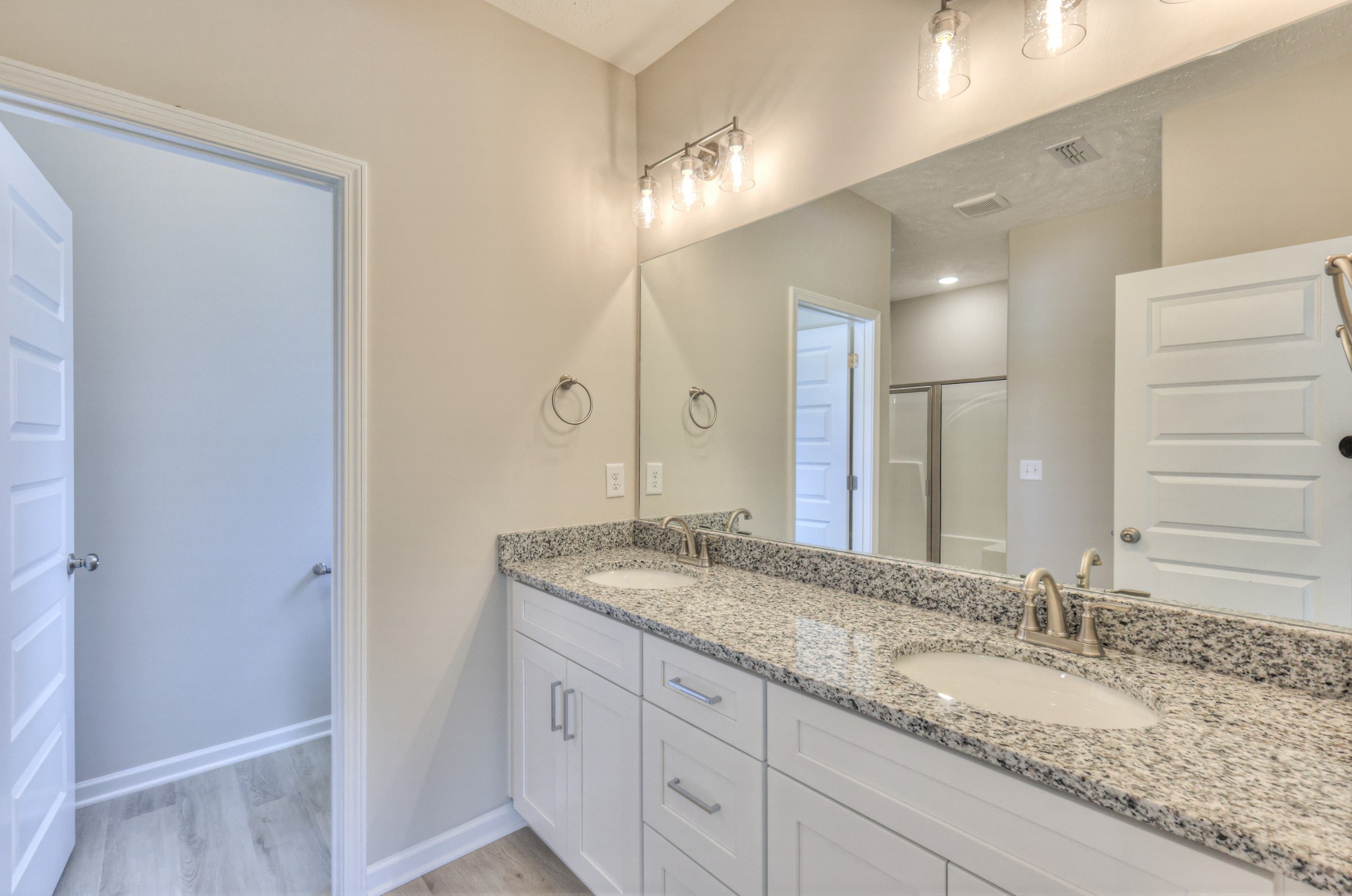 18 North Fork Branch Road Normandy, TN 37360 - Photo 5 of 28 a bathroom with a granite countertop double vanity sink and a mirror