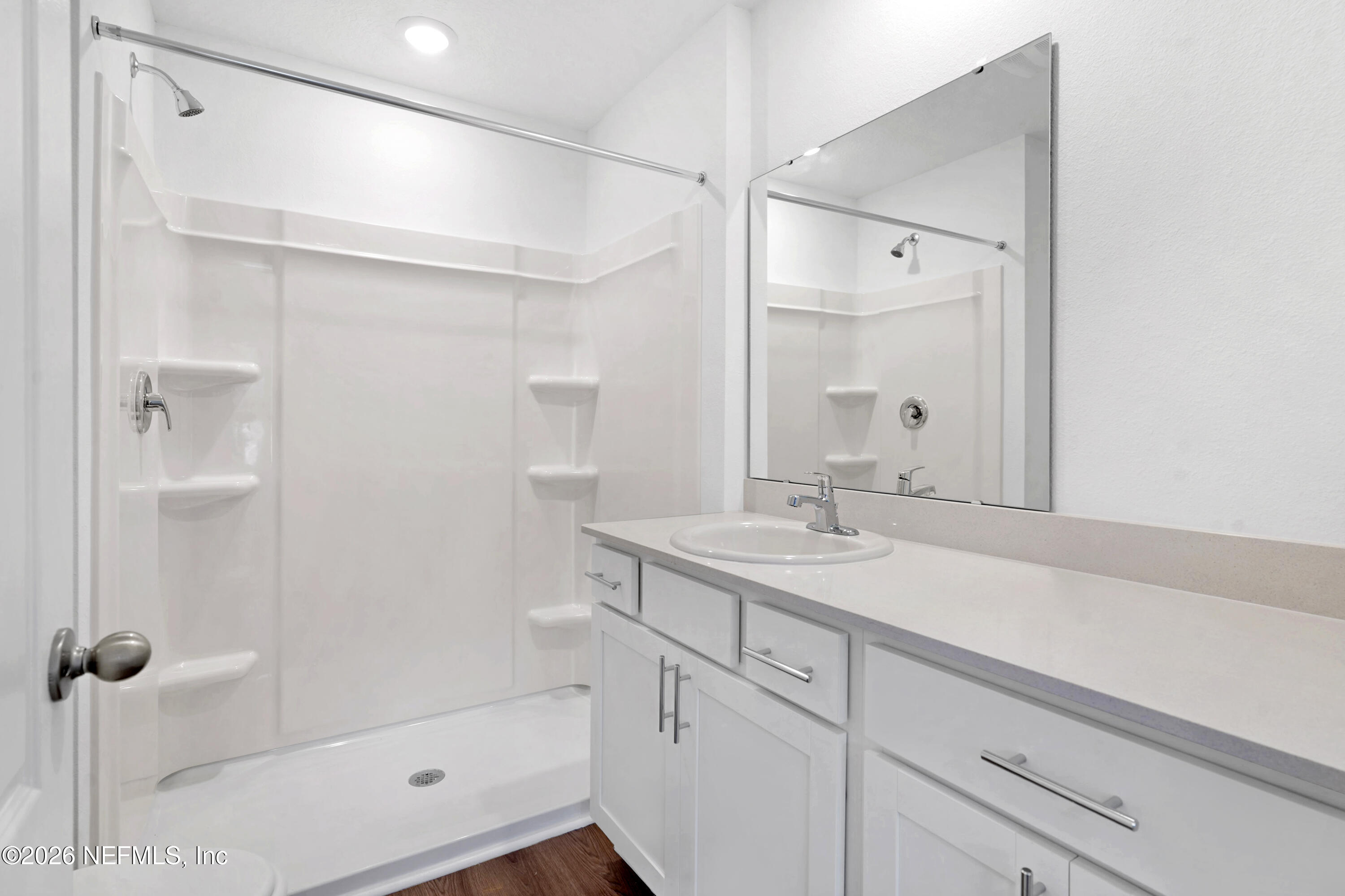 131 Palmetto Rdg Road St. Augustine, FL 32095 - Photo 14 of 26 a bathroom with a granite countertop sink mirror and shower