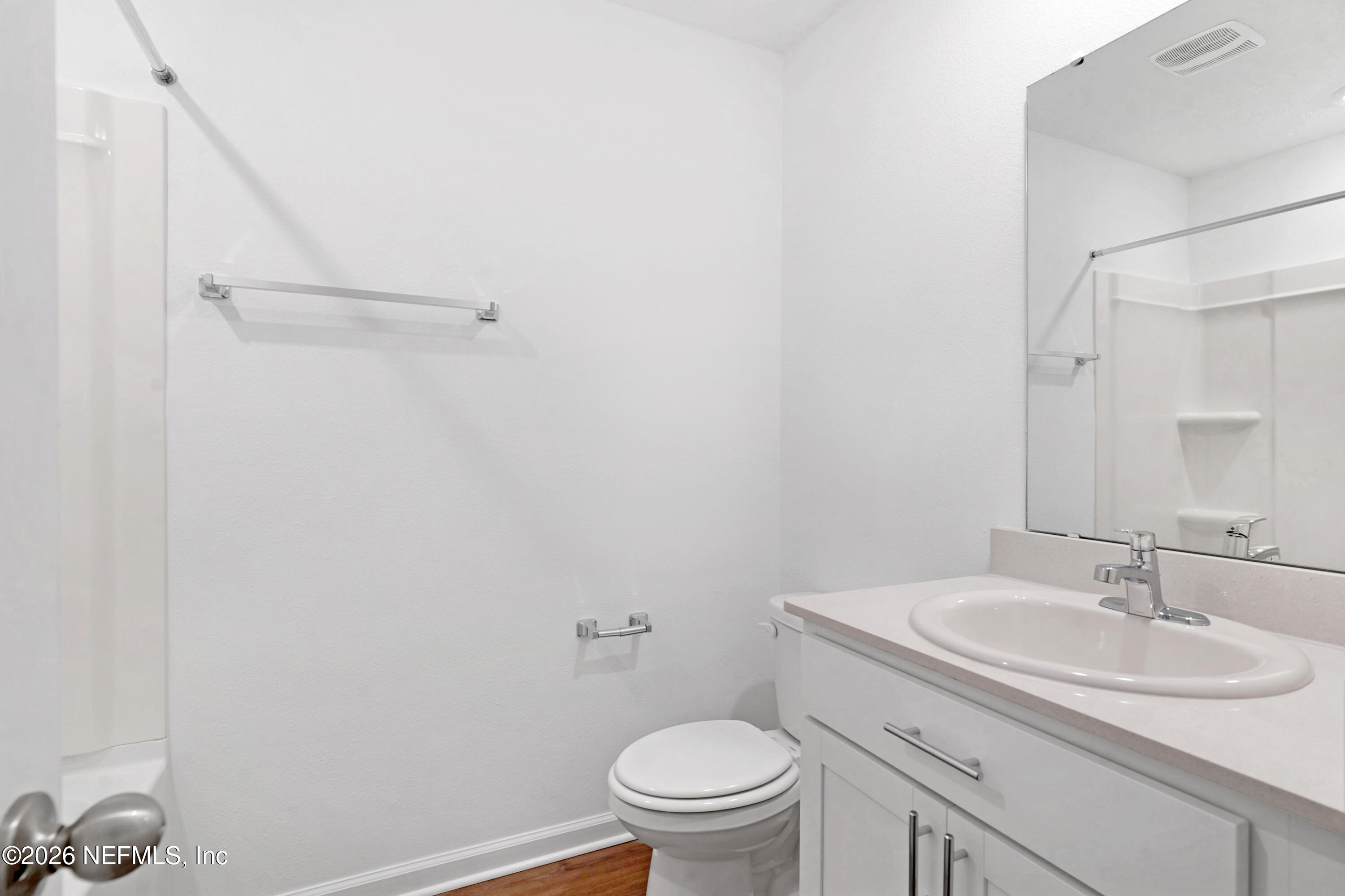 131 Palmetto Rdg Road St. Augustine, FL 32095 - Photo 17 of 26 a bathroom with a sink toilet and a mirror