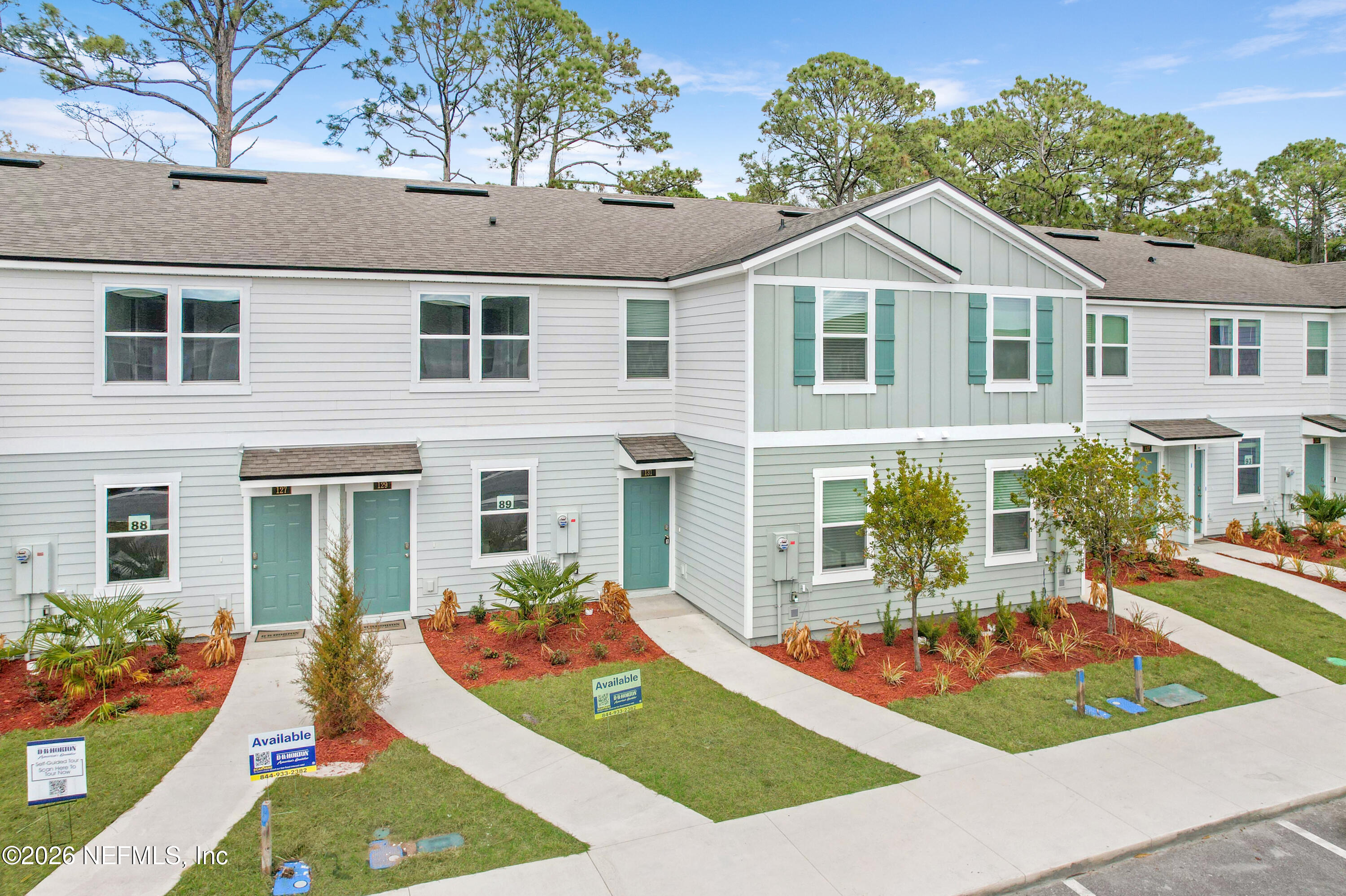 131 Palmetto Rdg Road St. Augustine, FL 32095 - Photo 2 of 26 front view of a house with a yard