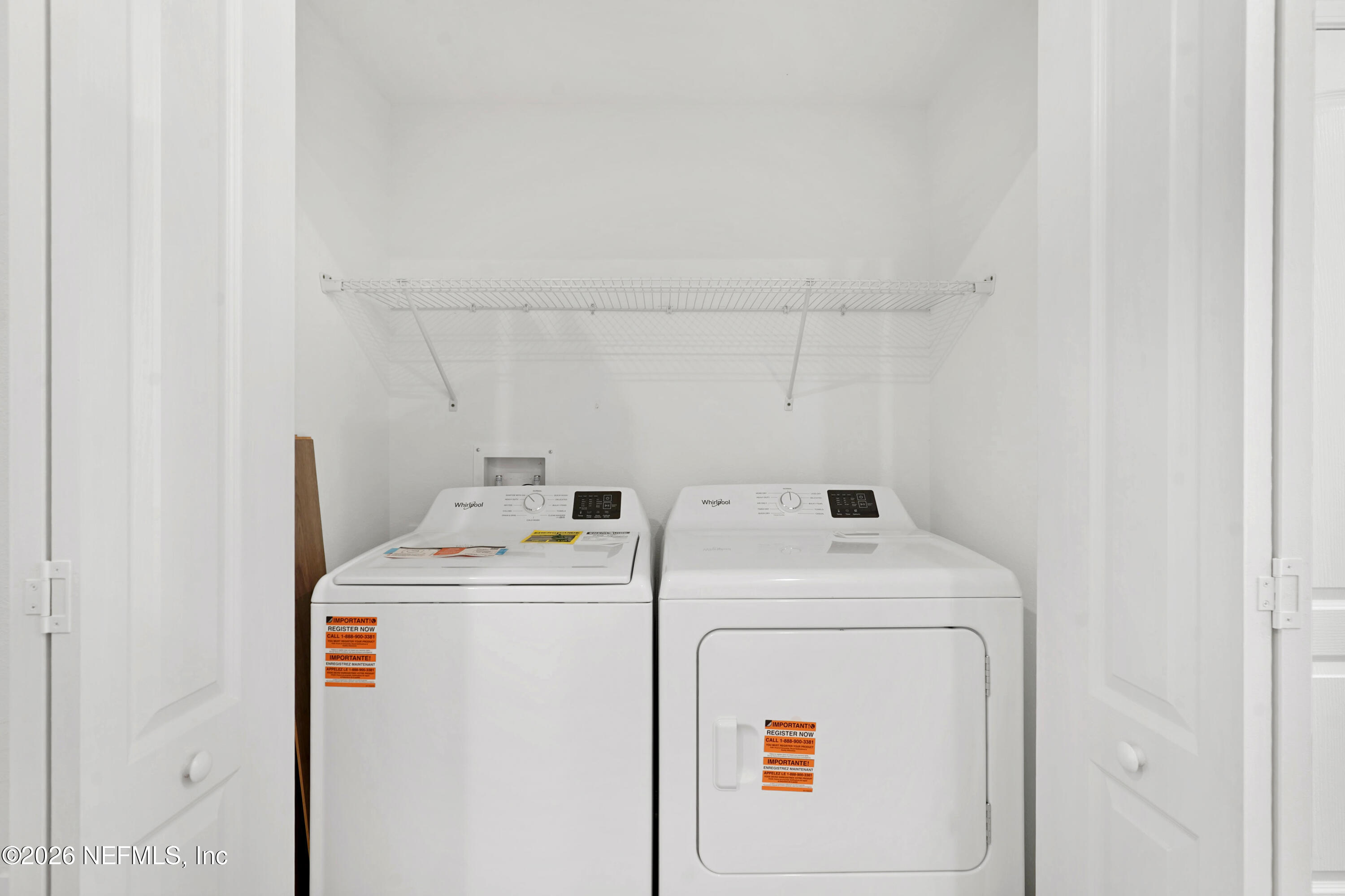 131 Palmetto Rdg Road St. Augustine, FL 32095 - Photo 8 of 26 a utility room with dryer and washer