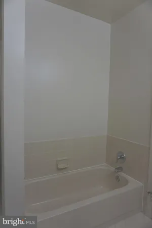 a close up of a bathtub in a bathroom