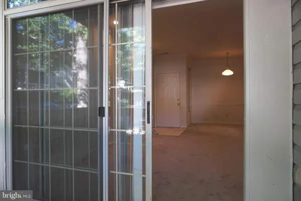 a bathroom with a glass door shower