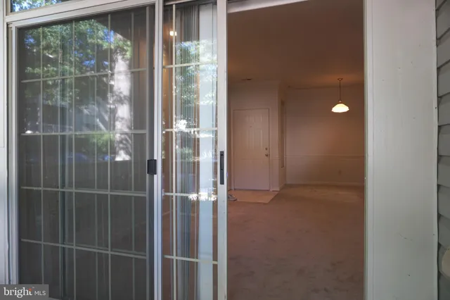 a bathroom with a glass door shower
