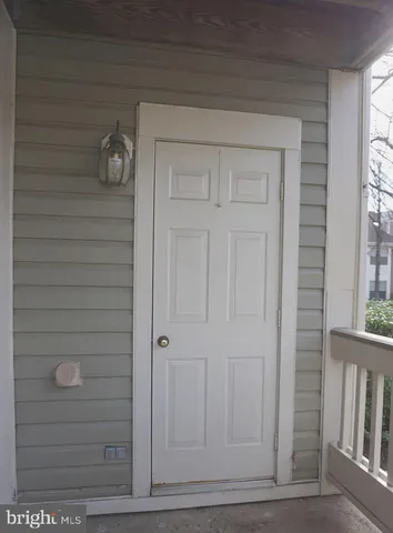a view of a house with a tree