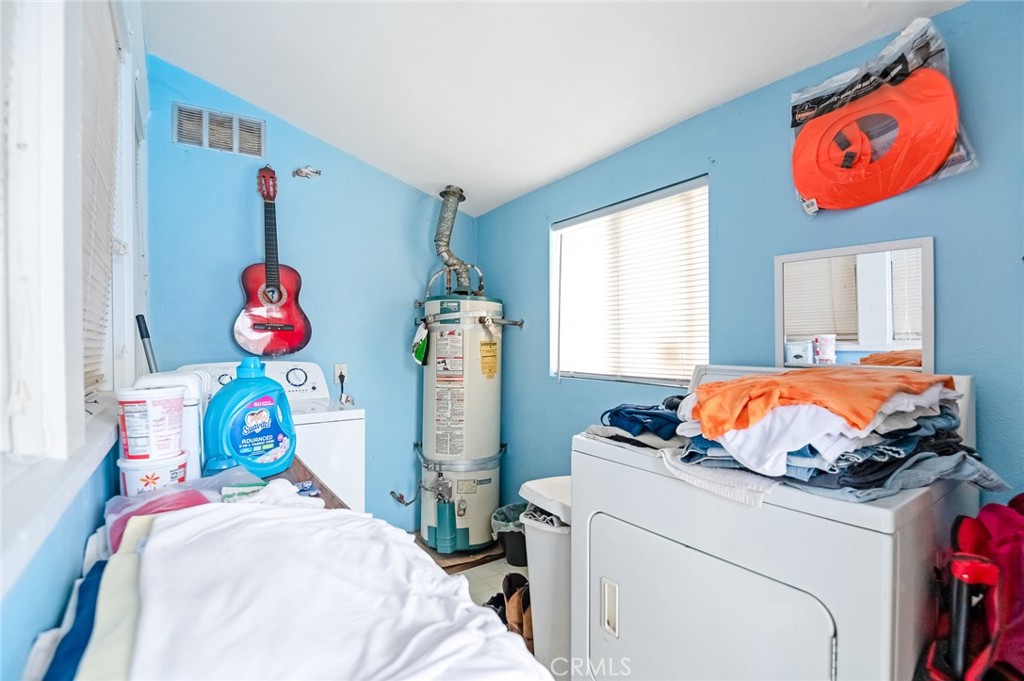 414 West Cameron Street Hanford, CA 93230 - Photo 11 of 12 a bedroom with bed and window