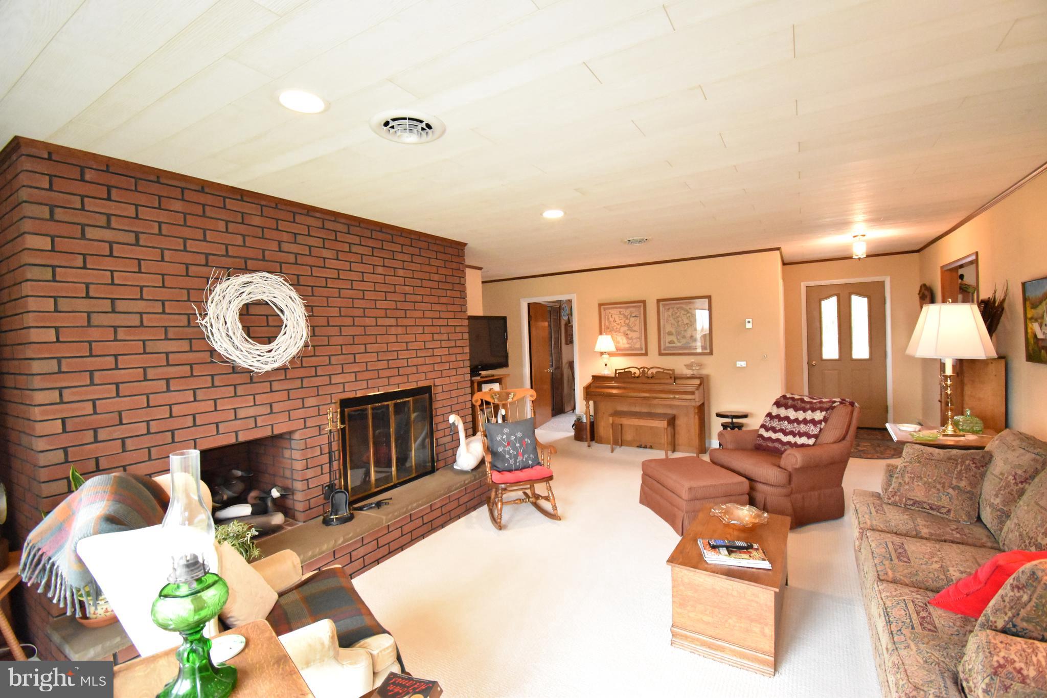 5535 Morris Neck Road Cambridge, MD 21613 - Photo 5 of 39 Living Room - Fireplace