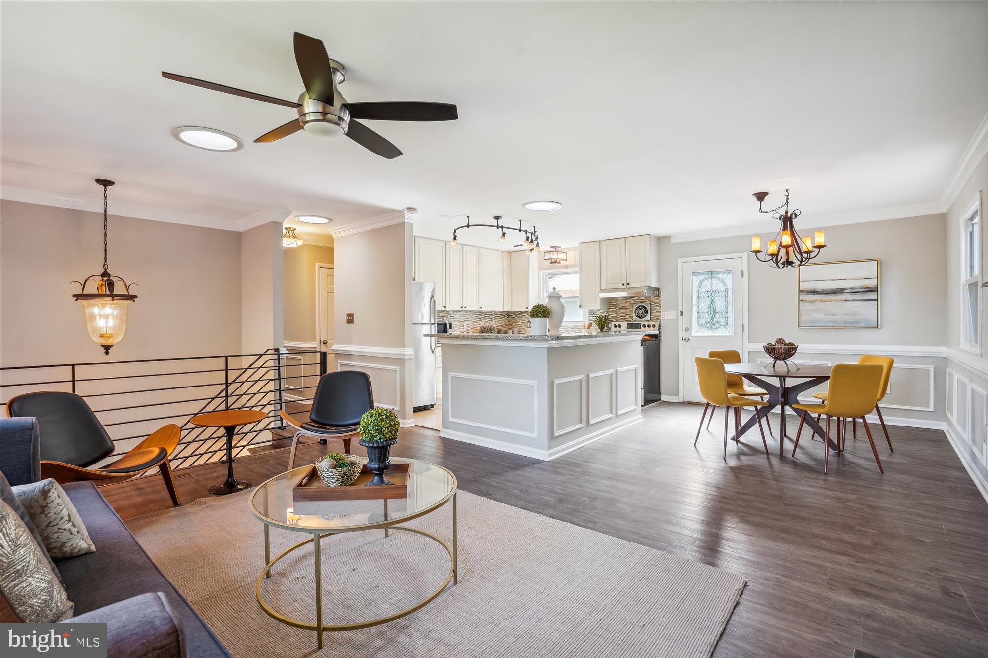 5742 Rolling Road Burke, VA 22015 - Photo 21 of 53 a living room with furniture and kitchen view