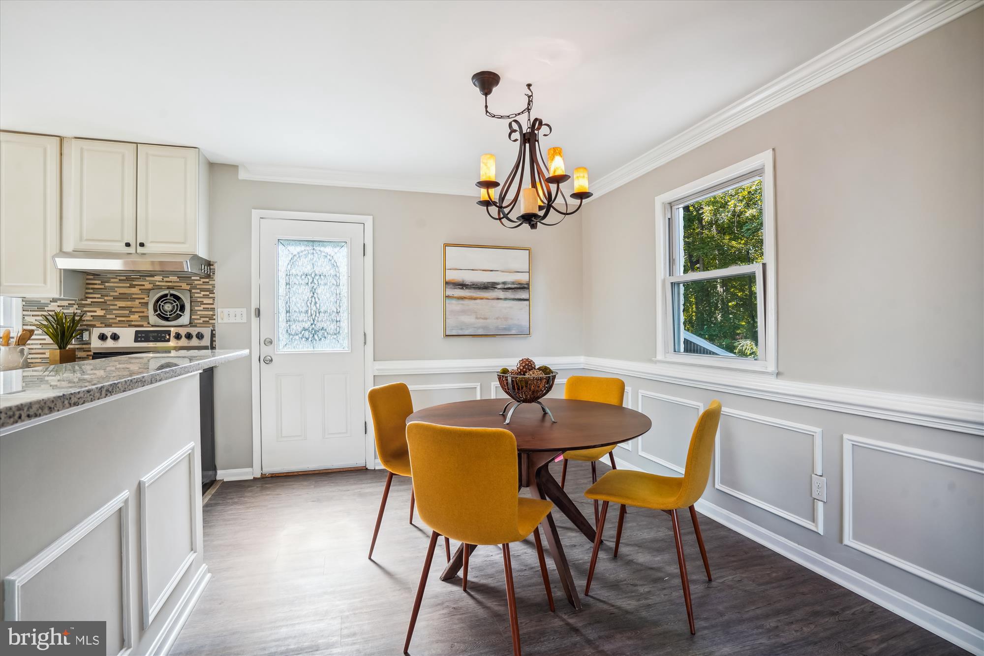 5742 Rolling Road Burke, VA 22015 - Photo 23 of 53 a view of a dining room with furniture window and outside view