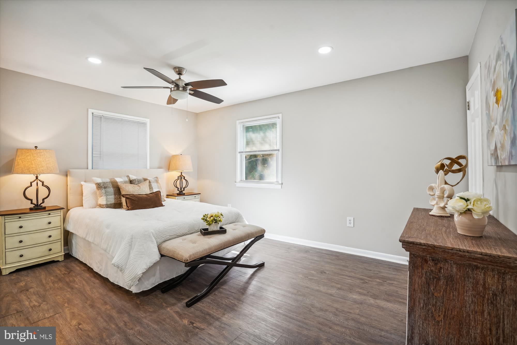 5742 Rolling Road Burke, VA 22015 - Photo 29 of 53 a bedroom with a bed and wooden floor